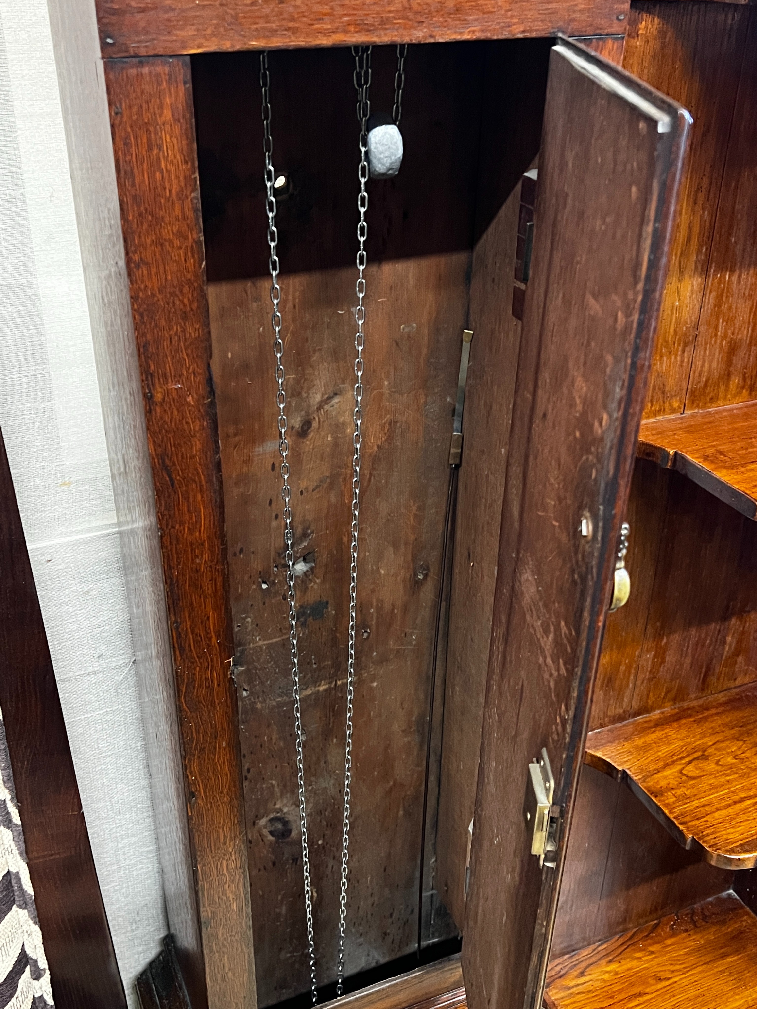 An early 19th century oak 30 hour longcase clock marked M. Irish, Lewes, height 196cm